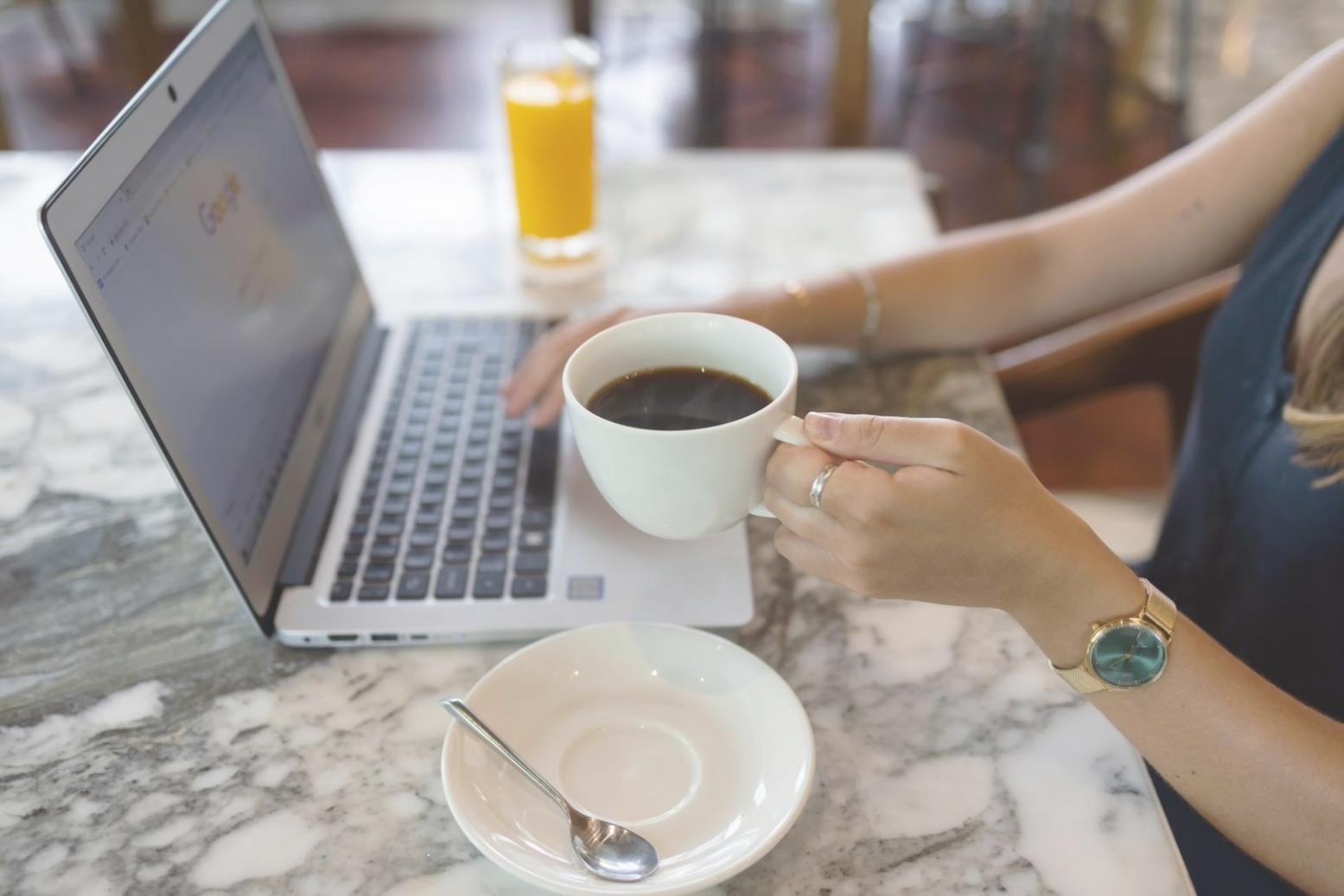 Family reviewing financial planning documents together at kitchen table